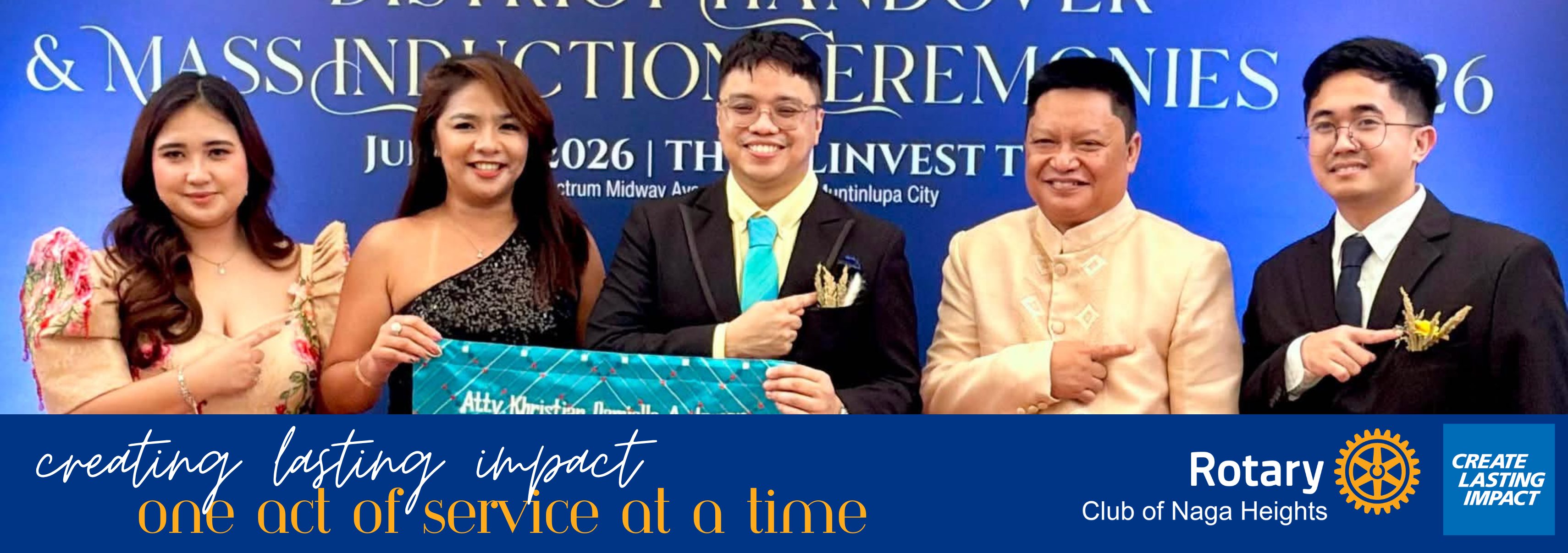 Rotary Club of Naga Heights members at the District Handover and Mass Induction Ceremonies, with the club's Create Lasting Impact theme banner.